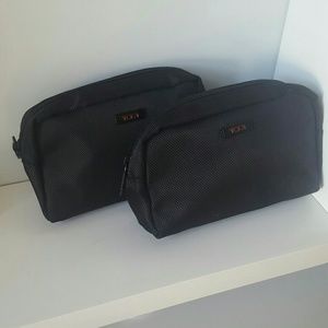 Two Tumi cosmetic bags/ travel kit